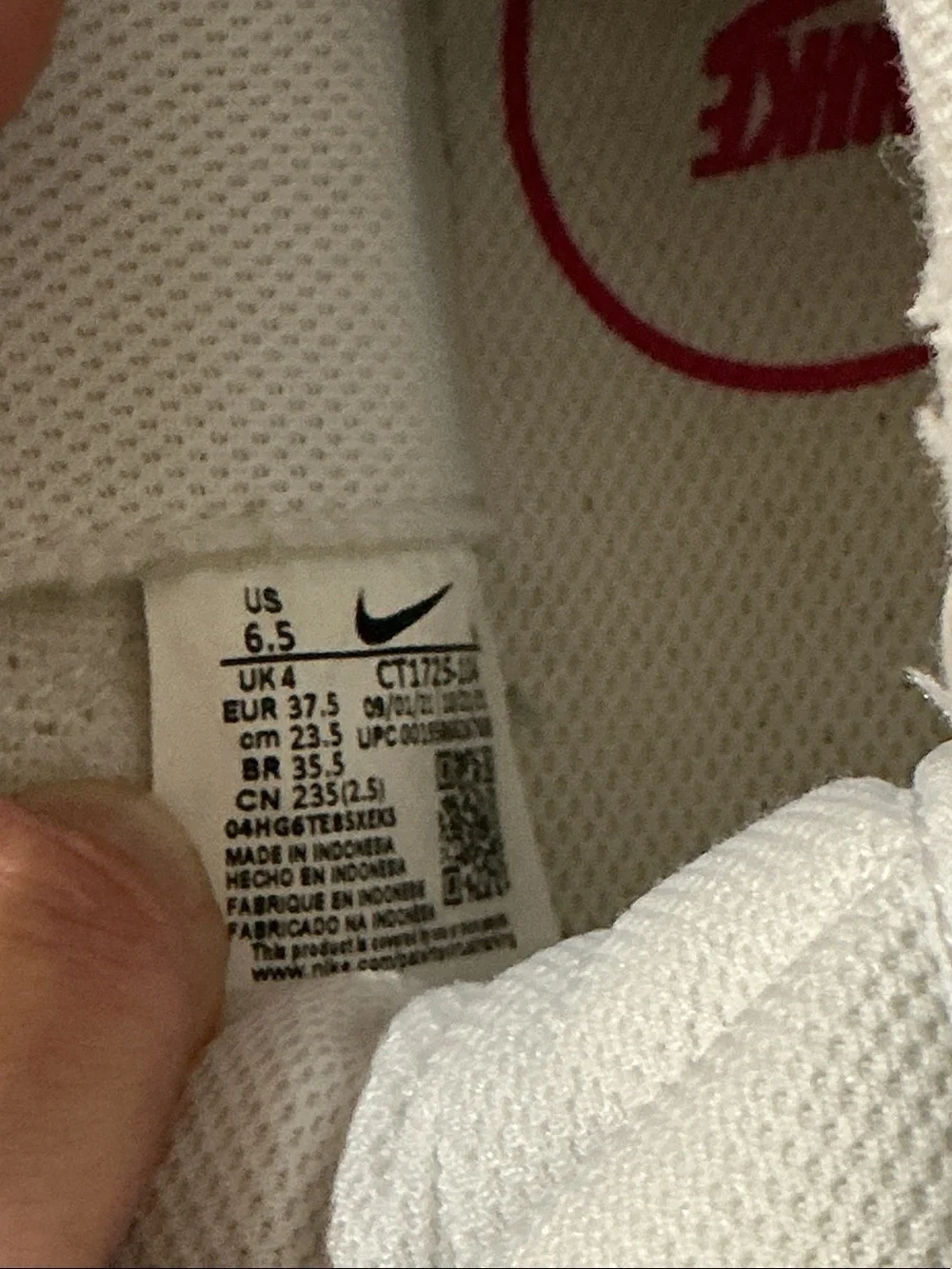 Nike Women's White Sneakers with Pink Swoosh High-Top